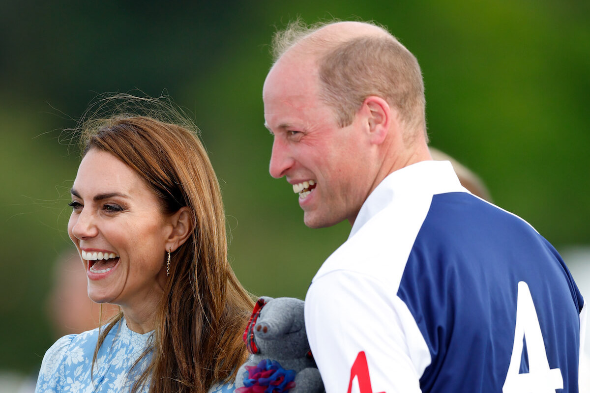 Kate Middleton and Prince William, who were 'relaxed' with PDA at a polo match, according to a body language expert, smile