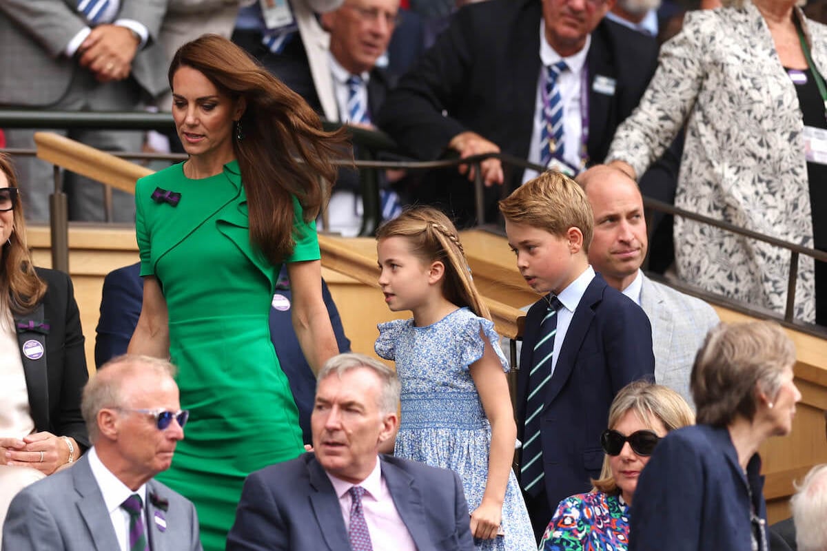 Kate Middleton walks with Prince George, Princess Charlotte, and Prince William at Wimbledon, where the rules surrounding curtsying and bowing to British royals changed in 2003