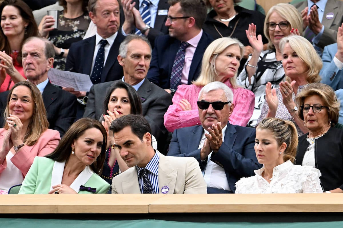 Kate Middleton, who was 'overcome' sitting with Roger Federer at Wimbledon, sits with Roger Federer and his wife