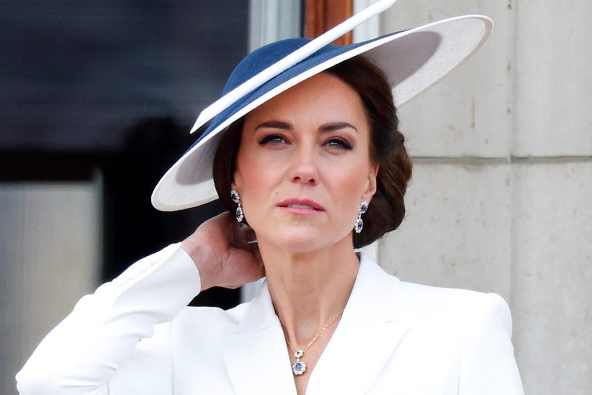 Kate Middleton, whose attitude toward royal family jewels comes down to two factors, looks on
