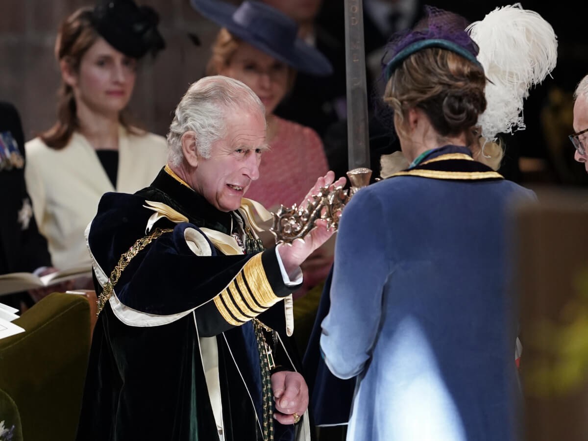 King Charles III is presented with the Elizabeth Sword by Dame Katherine Grainger during the National Service of Thanksgiving and Dedication for King Charles III and Queen Camilla, and the presentation of the Honours of at St Giles' Cathedral on July 5, 2023 in Edinburgh, Scotland
