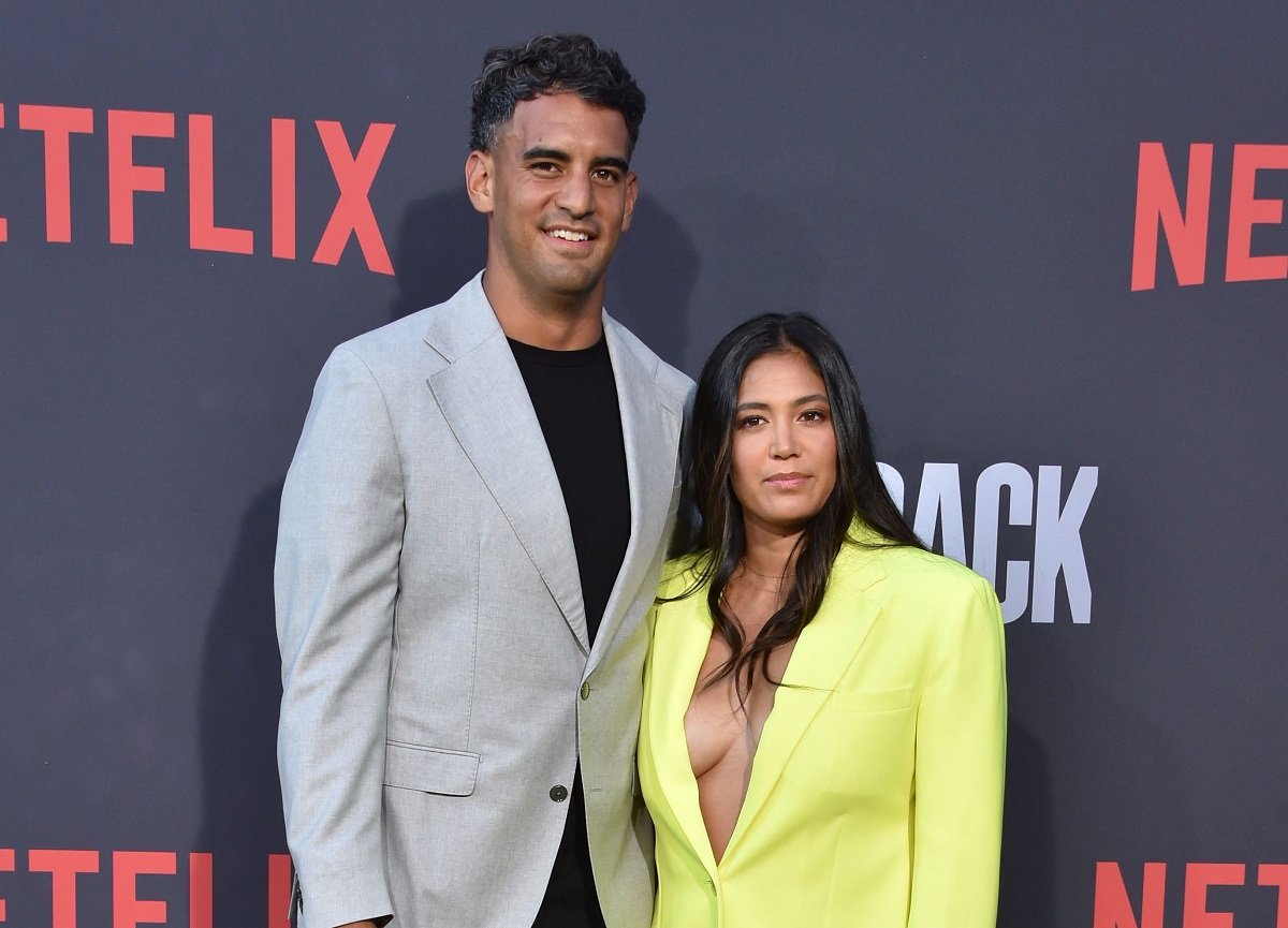 Marcus Mariota and his wife Kiyomi Cook arrive for the premiere of Netflix's docuseries 'Quarterback' at the Tudum Theatre in Los Angeles