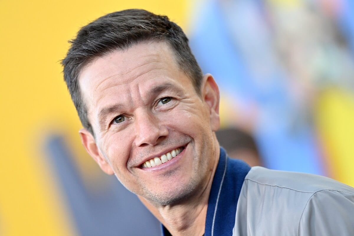 Mark Wahlberg taking a picture at the Netflix premiere of 'Me Time'.