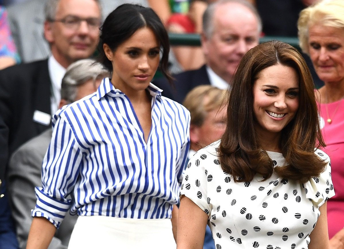 Meghan Markle and Kate Middleton, who fared better than her sister-in-law in a U.S. poll, attend day twelve of the Wimbledon Lawn Tennis Championships in 2018