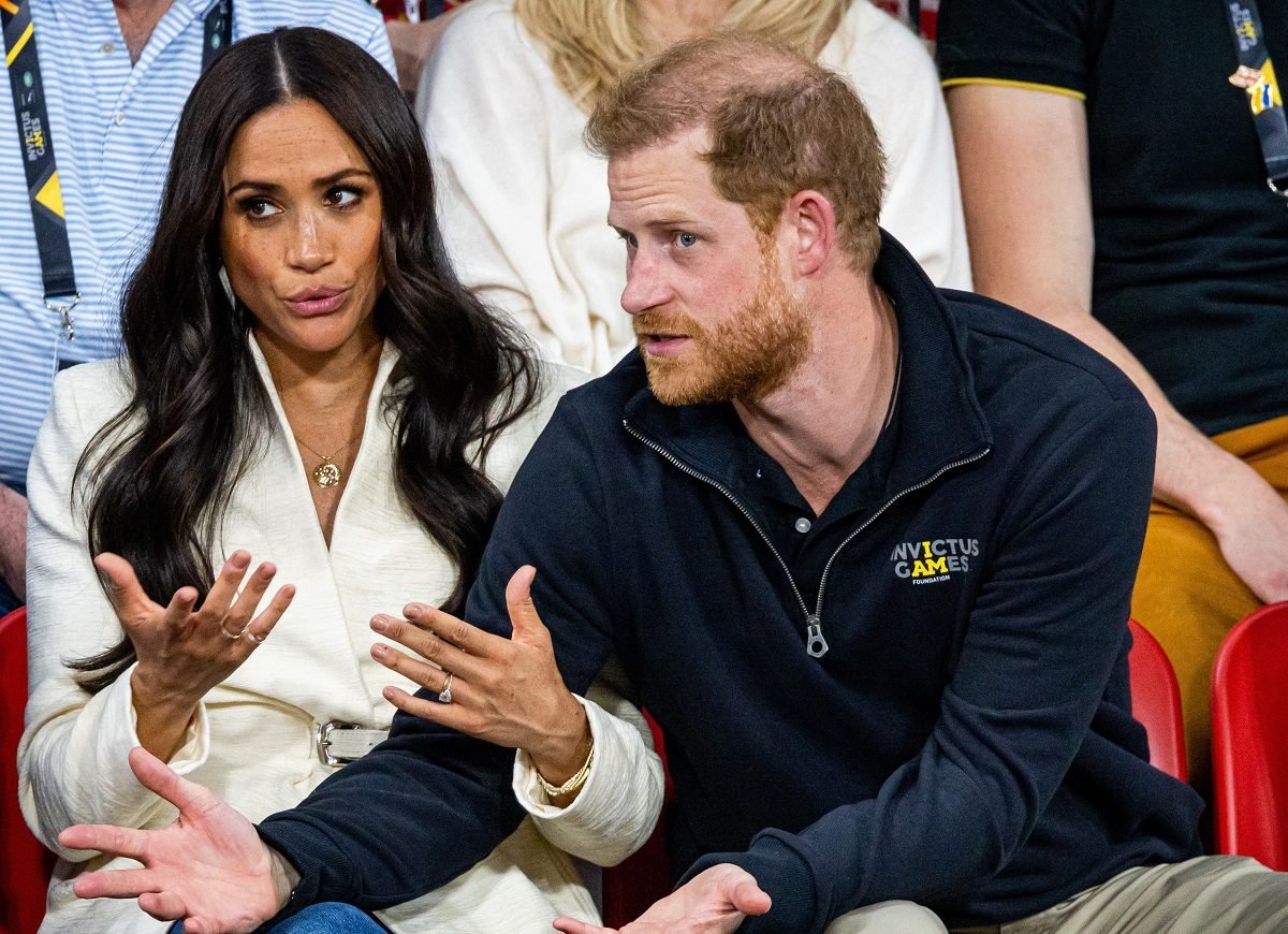 Meghan Markle and Prince Harry, who one commentator compared to Anna Nicole Smith, attend the volleyball on day two of the Invictus Games at Zuiderpark