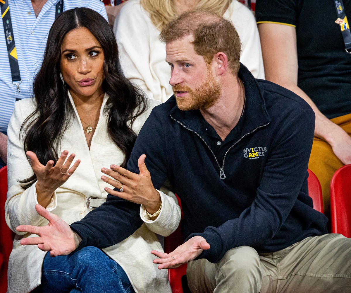 Meghan Markle and Prince Harry, who one commentator compared to Anna Nicole Smith, attend the volleyball on day two of the Invictus Games at Zuiderpark