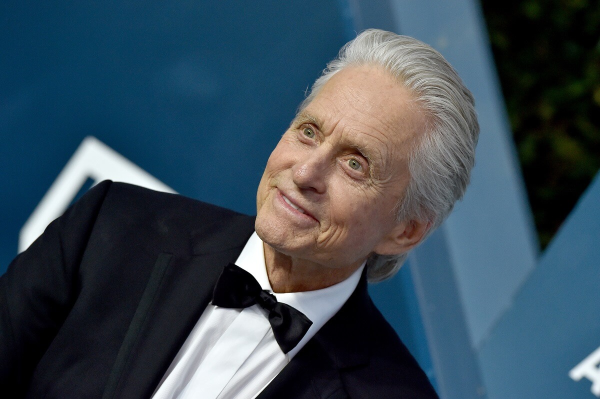 Michael Douglas taking a picture in a suit at the Annual Screen Actors Guild Awards.