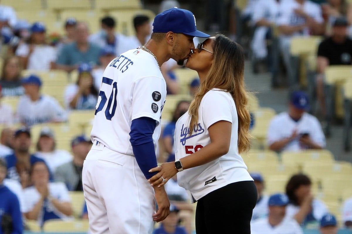 Mookie Betts kisses his wife Brianna Hammonds