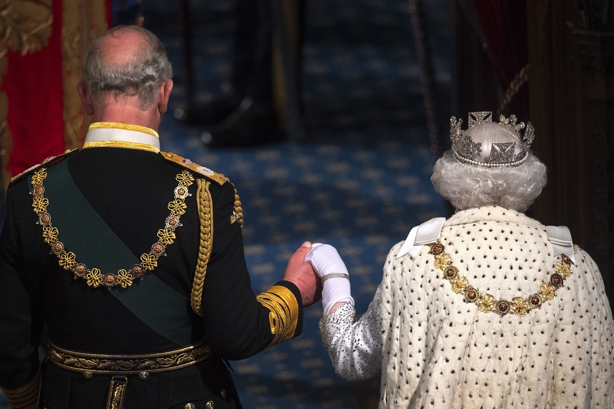 Now-King Charles III and his late mother, Queen Elizabeth II, at the State Opening of Parliament