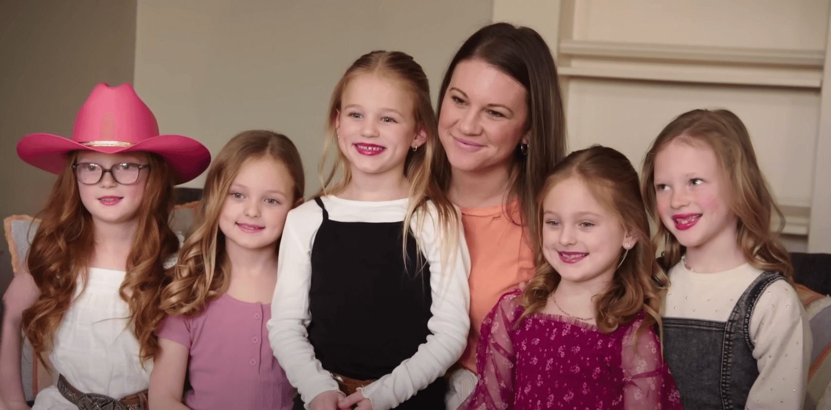 Danielle Busby and her 6 daughters posing in 'OutDaughtered' 2023