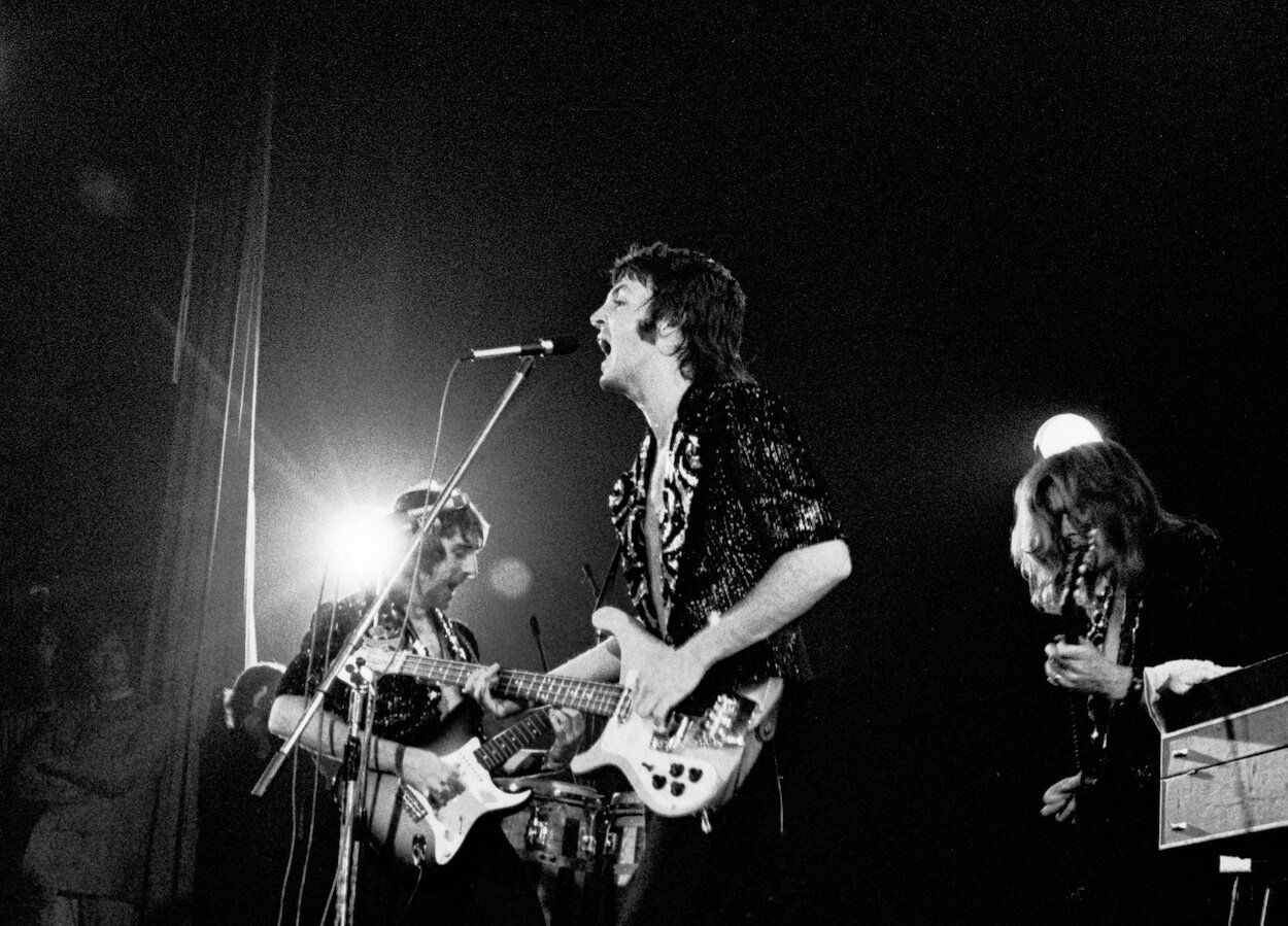 Wings members Denny Laine (from left), Paul McCartney, and Henry McCullough perform in France in 1972.