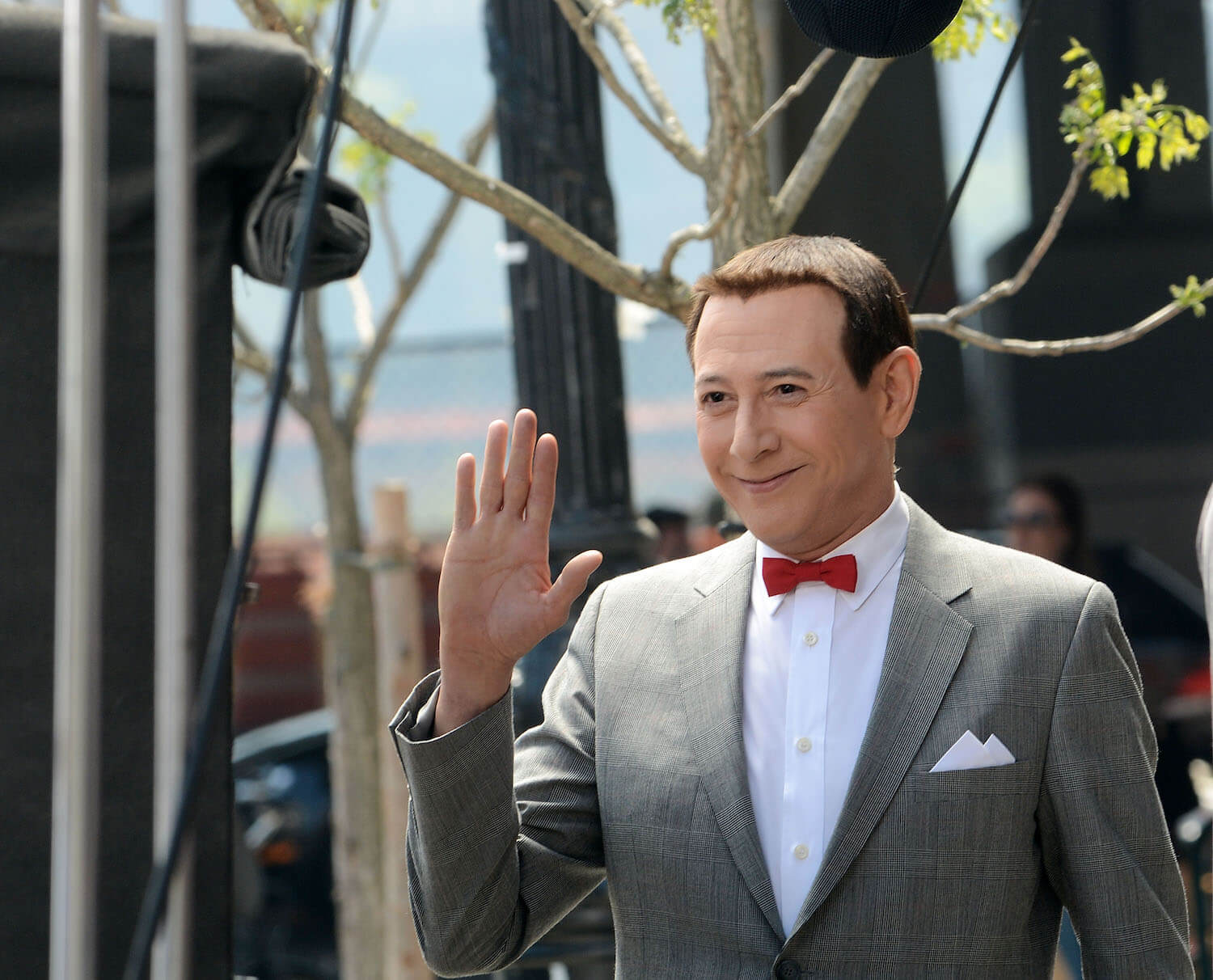 Pee-wee Herman actor Paul Reubens waving on set