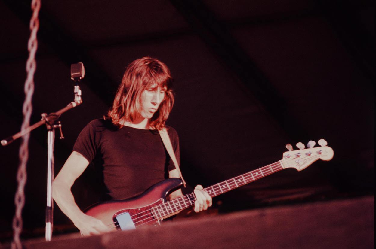 Pink Floyd bassist Roger Waters wearing a black t-shirt while performing in Japan in 1971.