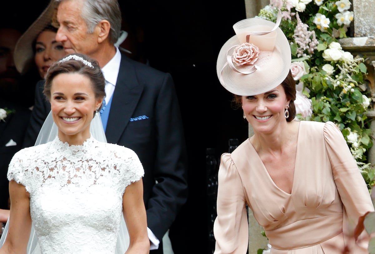 Pippa and Kate Middleton at Pippa's wedding to James Matthews in 2017