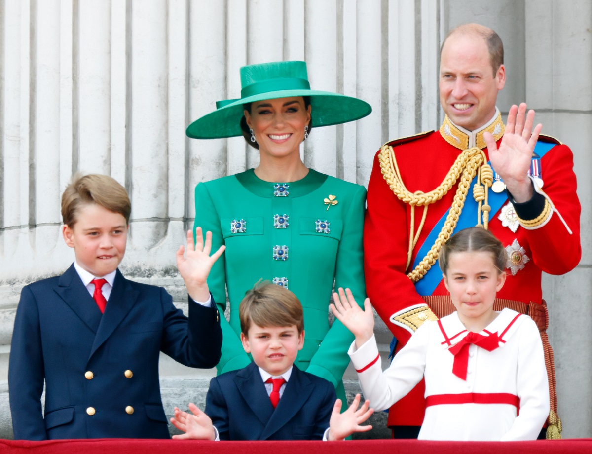 Prince George, Kate Middleton, Prince Louis, Prince William, and Princess Charlotte standing on the balcony of Buckingham Palace during Trooping the Colour