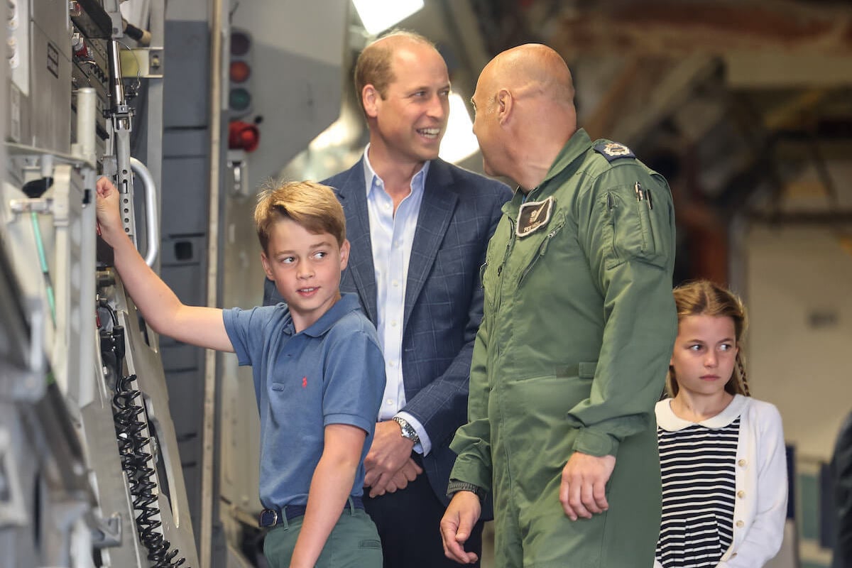 Prince George, who appeared in a 10th birthday portrait in July 2023, stands with Prince William and Princess Charlotte