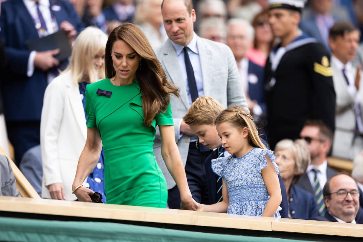 Prince George, who 'copes' with press attention because Kate Middleton's 'initiative' to share family photos, walks with Princess Charlotte, Prince George, and Prince William