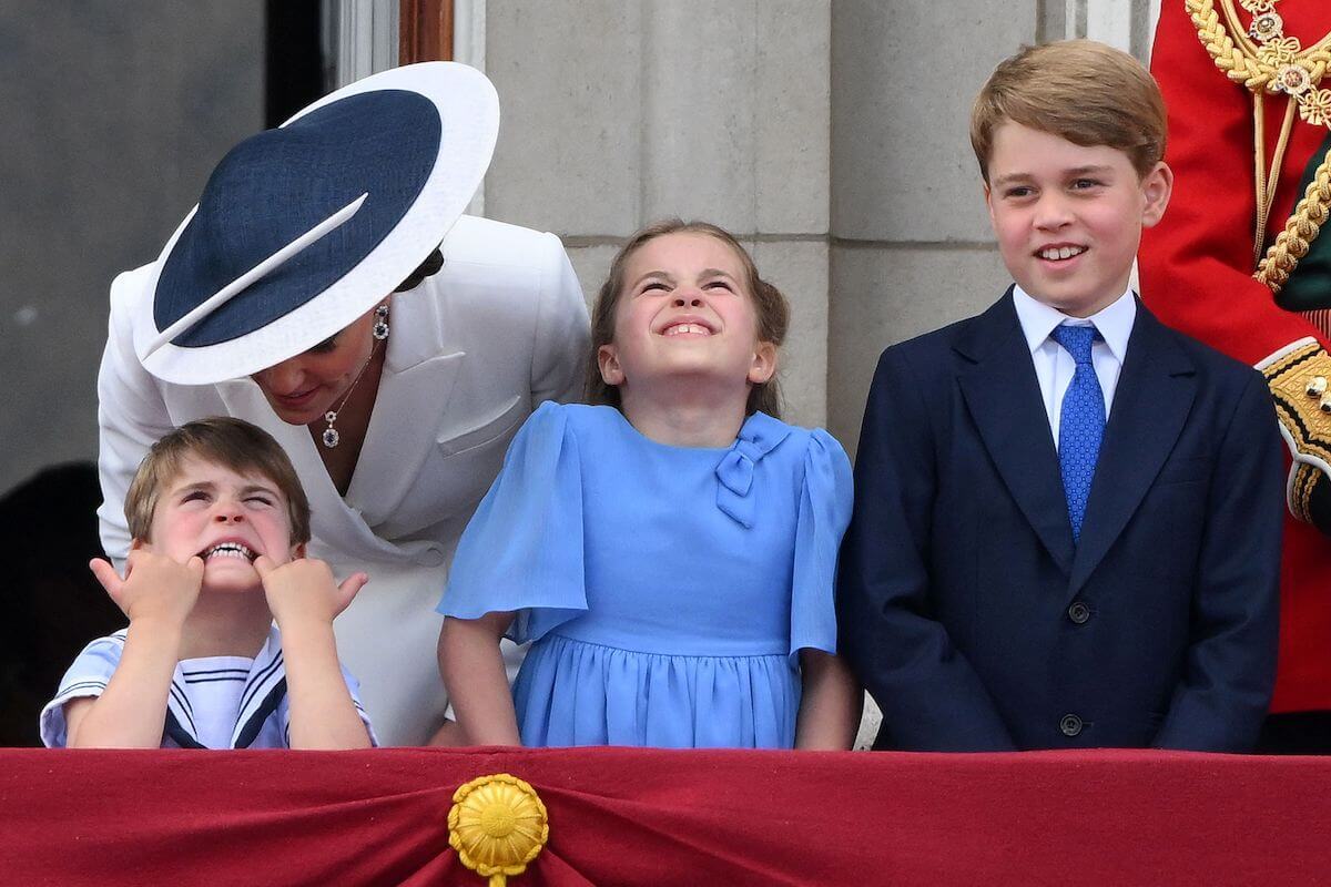 Prince George, who 'copes' with pressure because of Kate Middleton, stands with his mother and siblings Prince Louis and Princess Charlotte