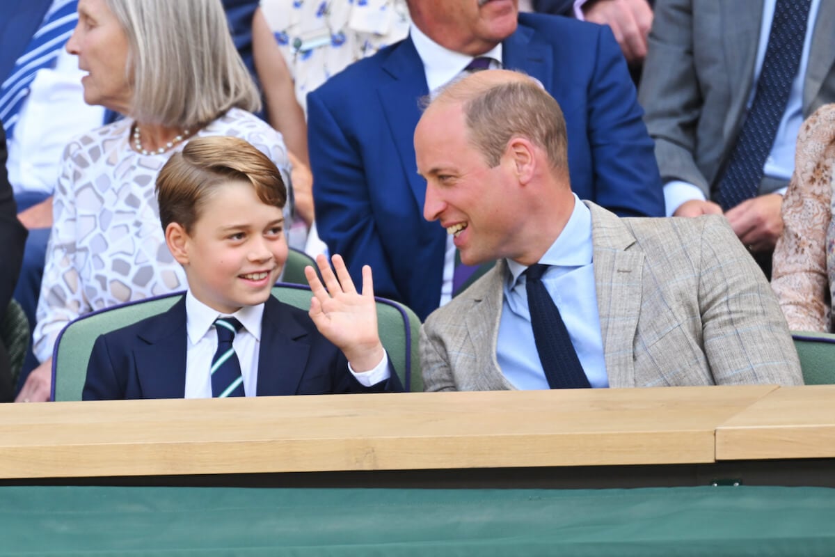 Prince George, who doesn't have the same 'burden' about the line of succession as Prince William, sits with his father in the royal box at Wimbledon