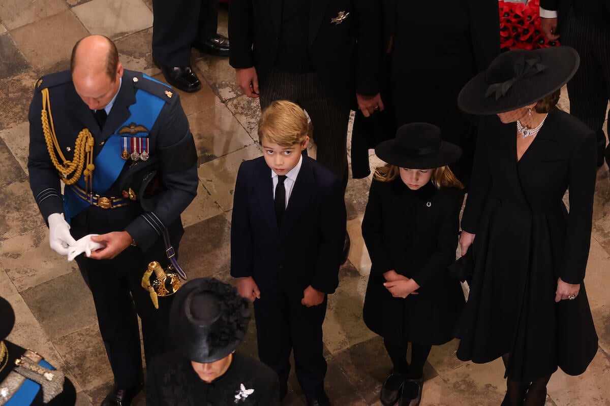 Prince George, who has had a 'baptism of fire,' stands with Prince William, Princess Charlotte, and Kate Middleton