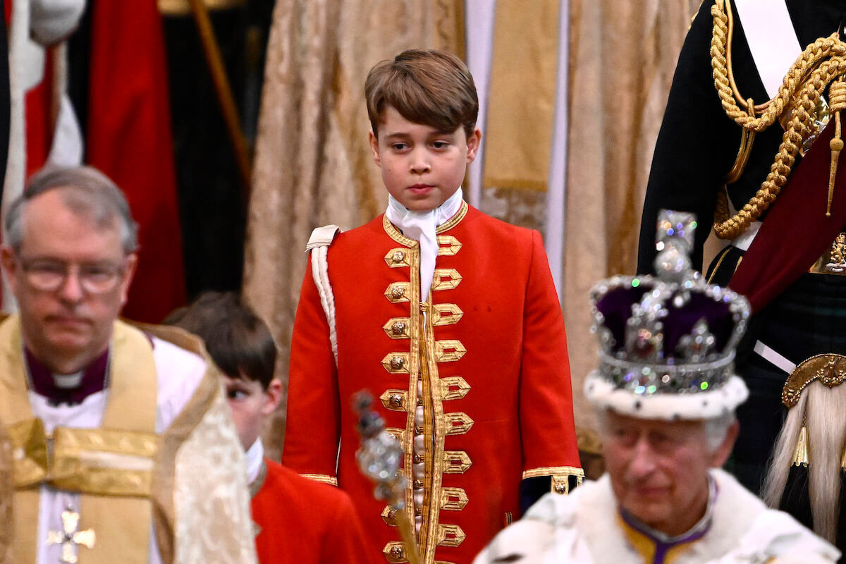 Prince George, who has had a 'baptism of fire' with Platinum Jubilee, Queen Elizabeth II's funeral, and the coronation, walks behind King Charles III