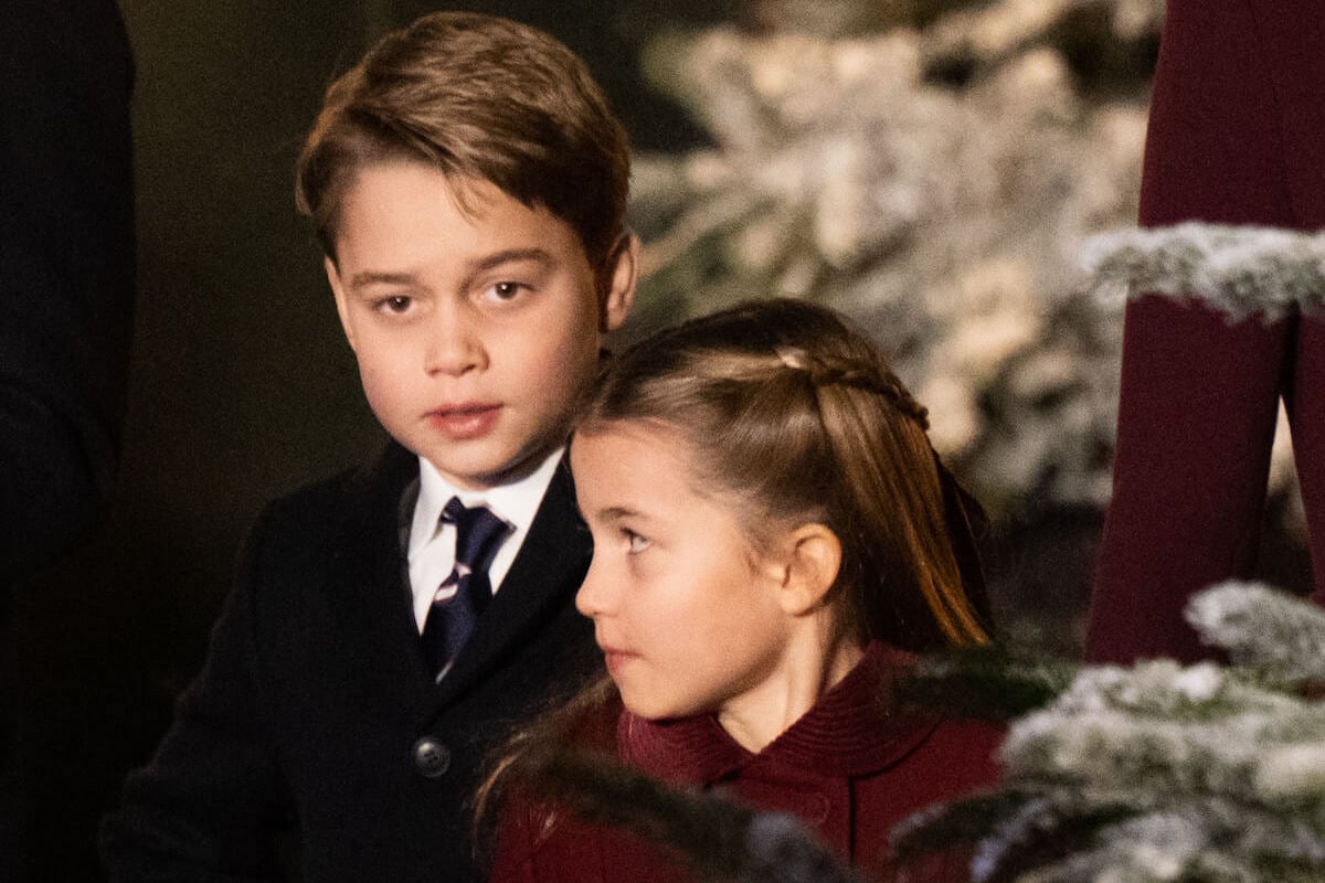 Prince George, who will lose Princess Charlotte 'support' act, stands with Princess Charlotte