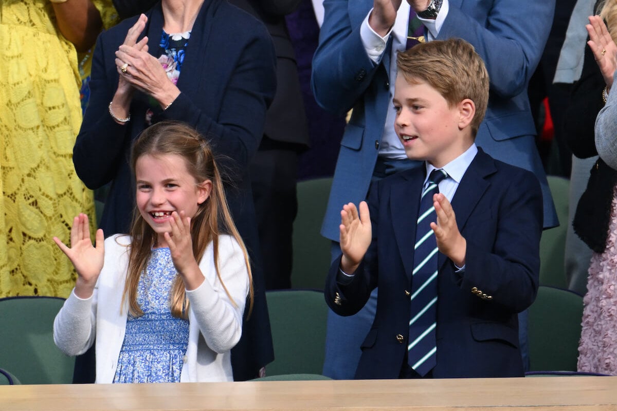 Prince George, who will lose Princess Charlotte 'support' if he attends Eton College, stands next to his sister