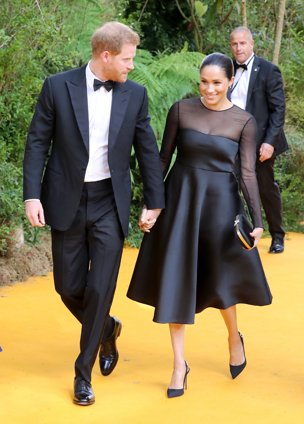 Prince Harry and Meghan Markle attend "The Lion King" European Premiere