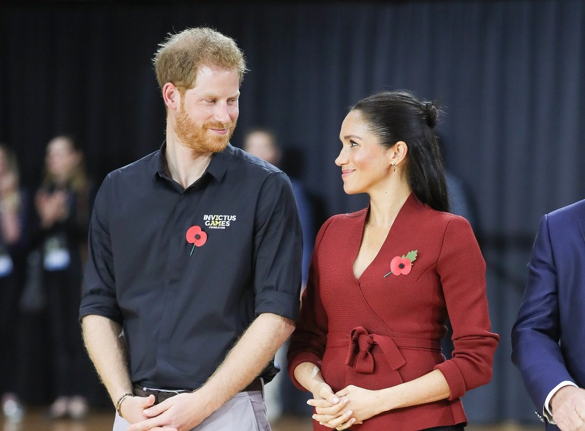 Prince Harry and Meghan Markle attend the Wheelchair Basketball gold medal match during day eight of the Invictus Games Sydney