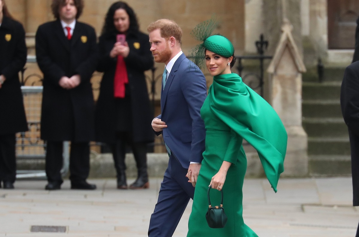Prince Harry and Meghan Markle walking into Westminster Abbey for the Commonwealth Day Service in 2020, which was their final engagement as working royals 