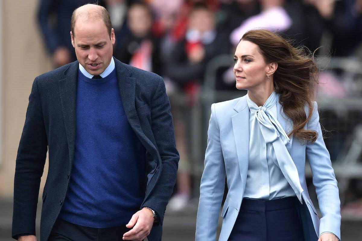 Prince William and Kate Middleton, whose 'normal life' ended, look on wearing blue