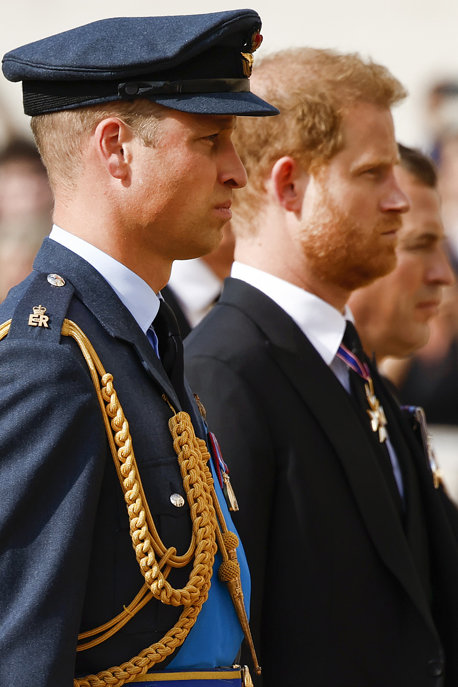 Prince William and Prine Harry walk behind the coffin during the procession for the Lying-in State of Queen Elizabeth II