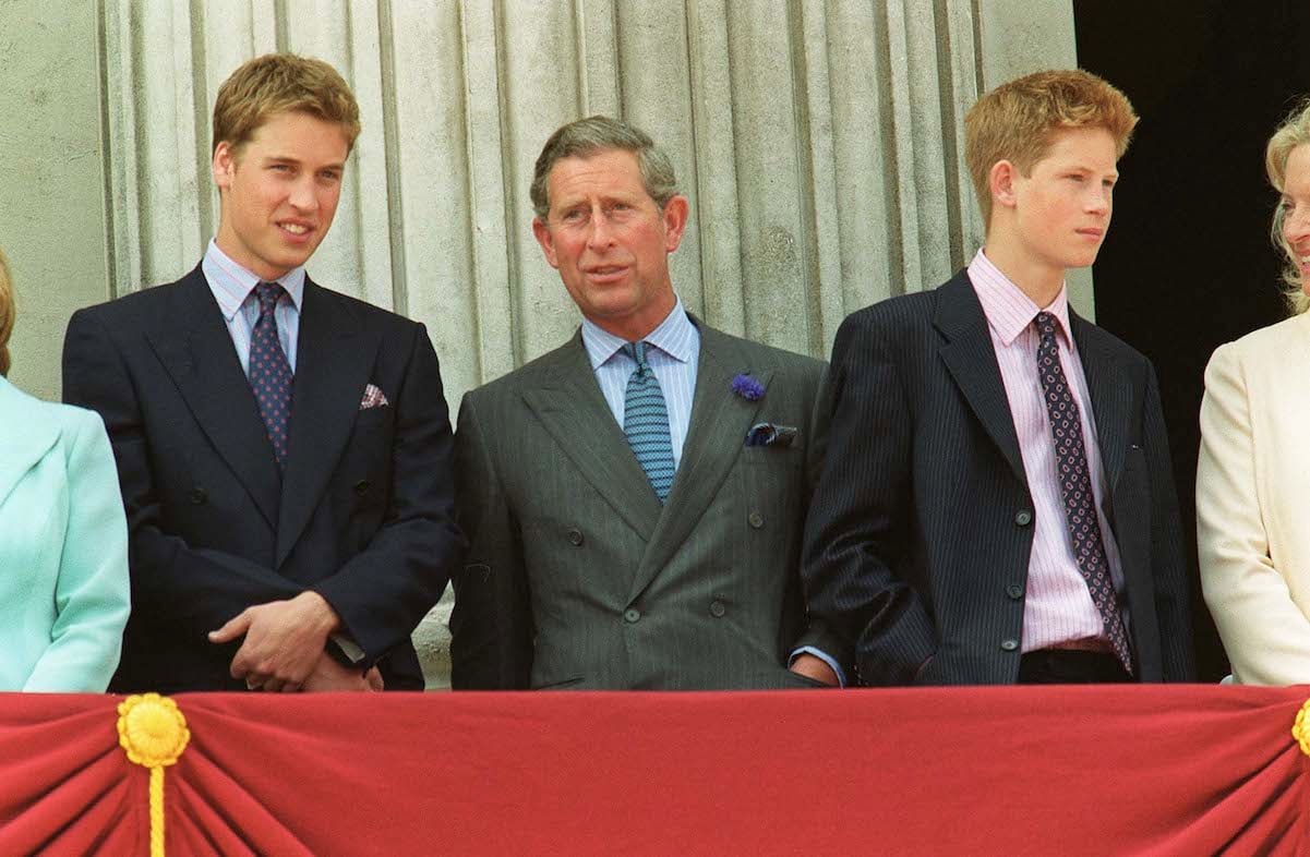 Prince William with his father, King Charles, and brother, Prince Harry, in 2000
