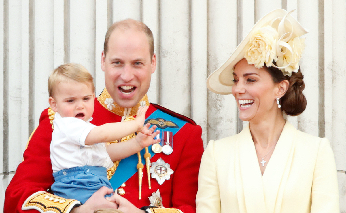Prince William holds Prince Louis next to Kate Middleton in 2019