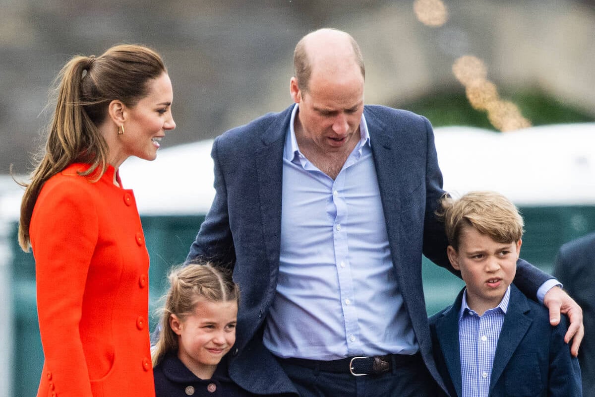 Prince William, who treats Prince George and Princess Charlotte as 'equals,' stands with Kate Middleton and his two oldest children