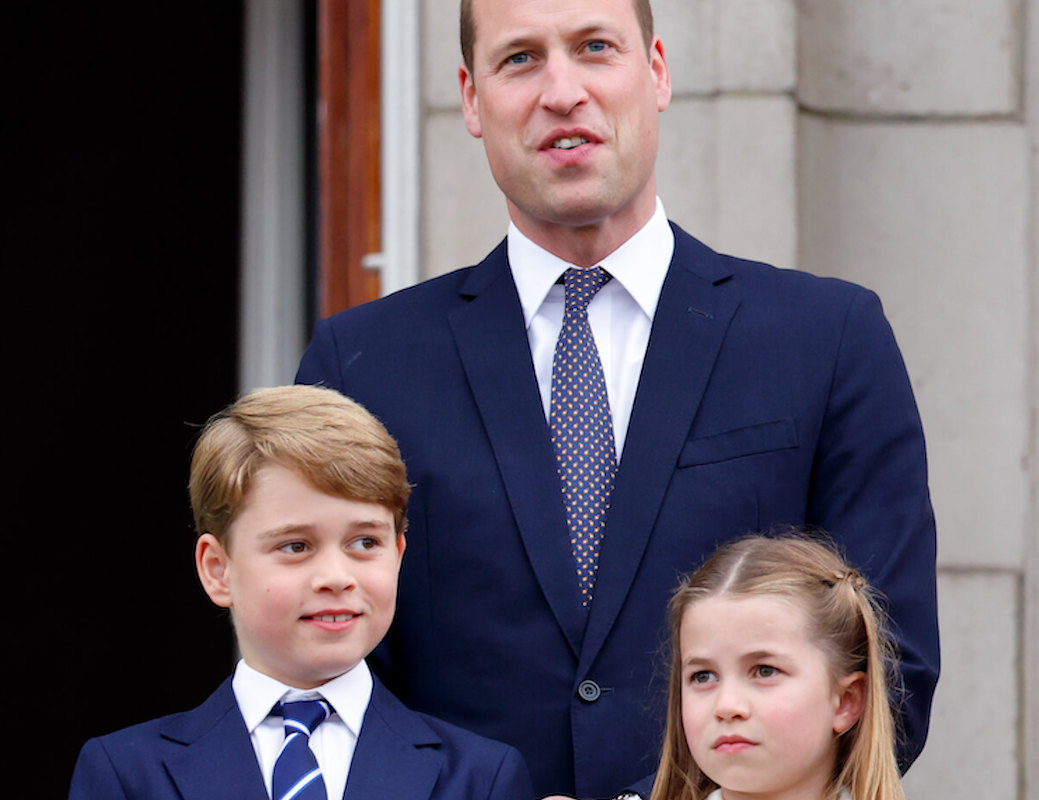 Prince William, whom a body language expert says treats Prince George and Princess Charlotte as 'equals,' stands with his two oldest children