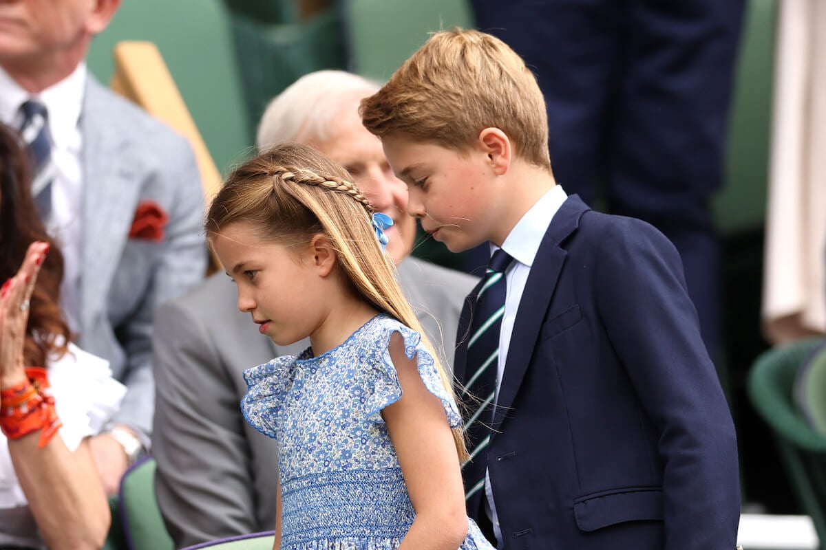 Princess Charlotte, who had a 'shy' moment at Wimbledon, walks with Prince George