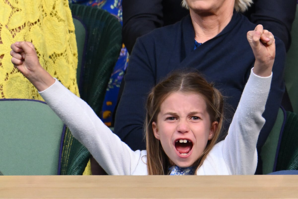 Princess Charlotte, who had an 'extra shy' moment at Wimbledon with Carlos Alcaraz, cheers