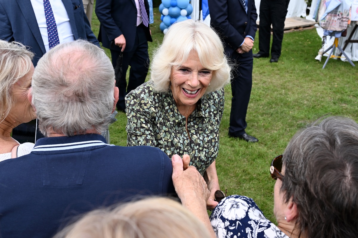 Queen Camilla greets well wishers during he visit to Sandringham Flower Show at Sandringham House