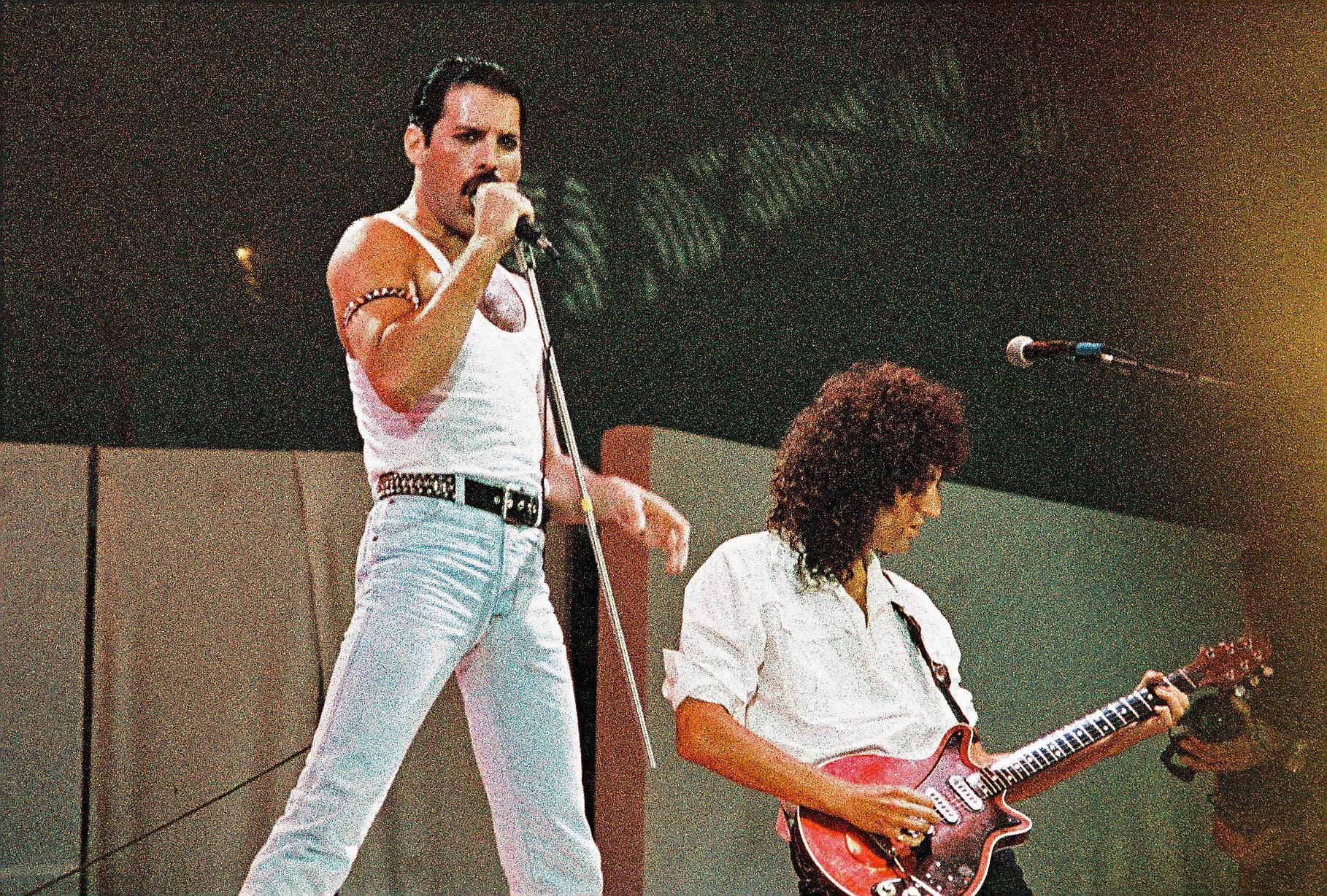 Freddie Mercury and Brian May of Queen perform at Live Aid in Wembley Stadium in London, England