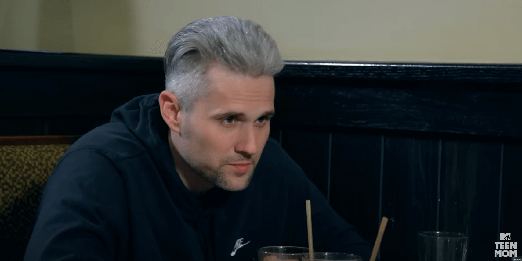 Ryan Edwards leans forward in a black top while filming in 'Teen Mom: The Next Chapter' Season 2