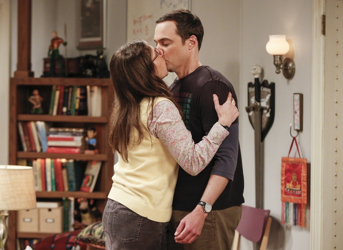 Amy and Sheldon kiss in an episode of 'The Big Bang Theory'