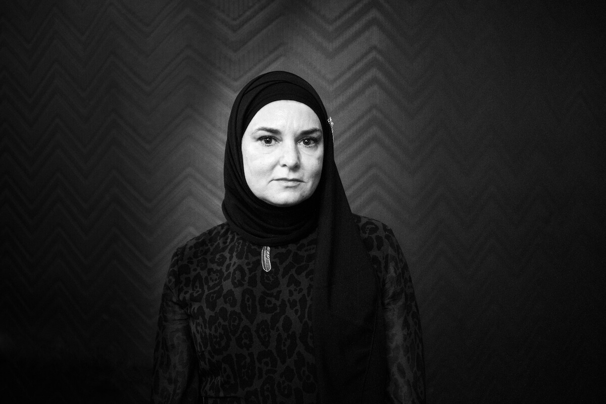 Black and white photo of Sinead O'Connor wearing a hijab