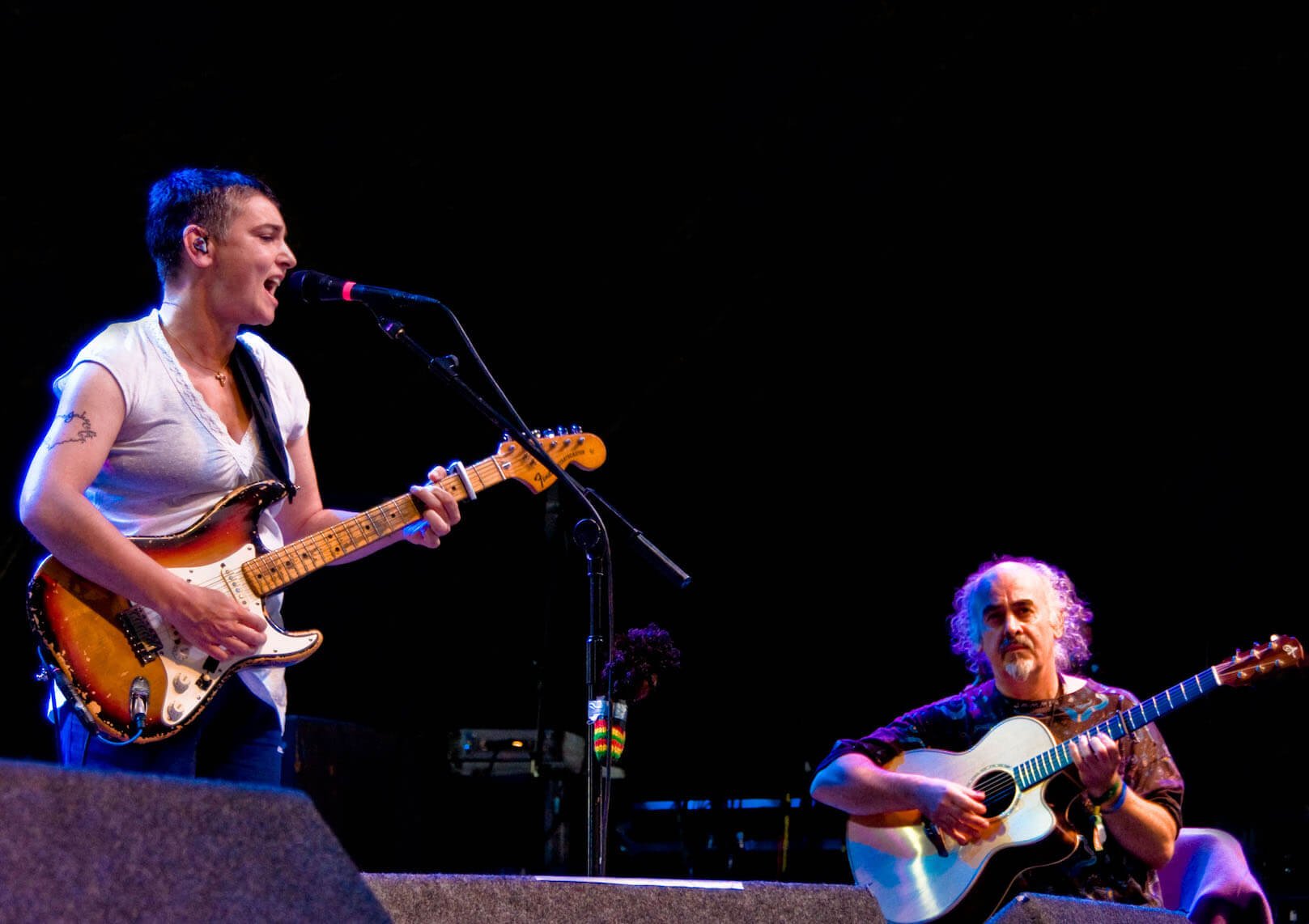 Sinead O'Connor and her husband, Steve Cooney, performing together on stage