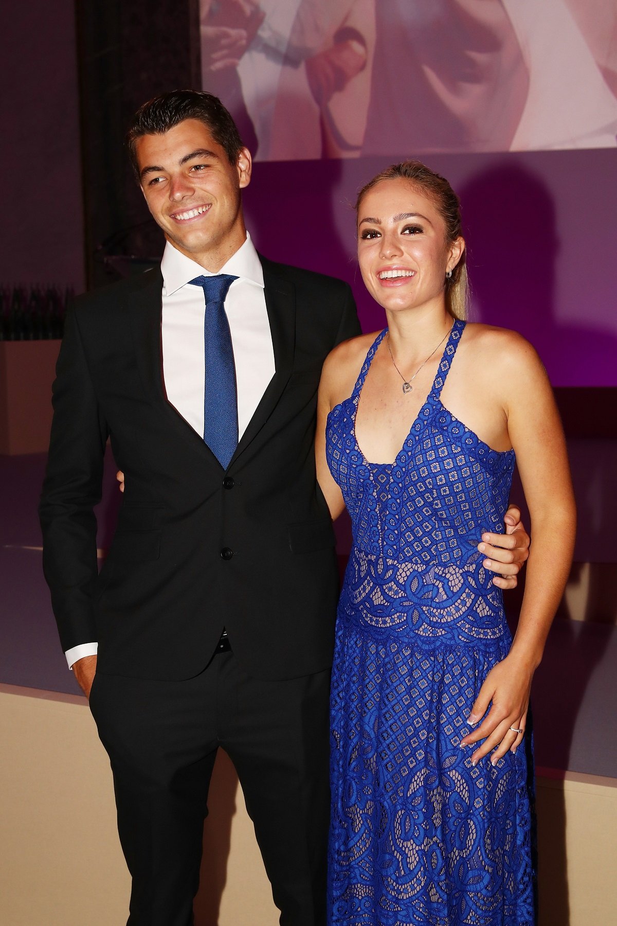 Taylor Fritz and Raquel Pedraza pose for the cameras during the ITF World Champions Dinner