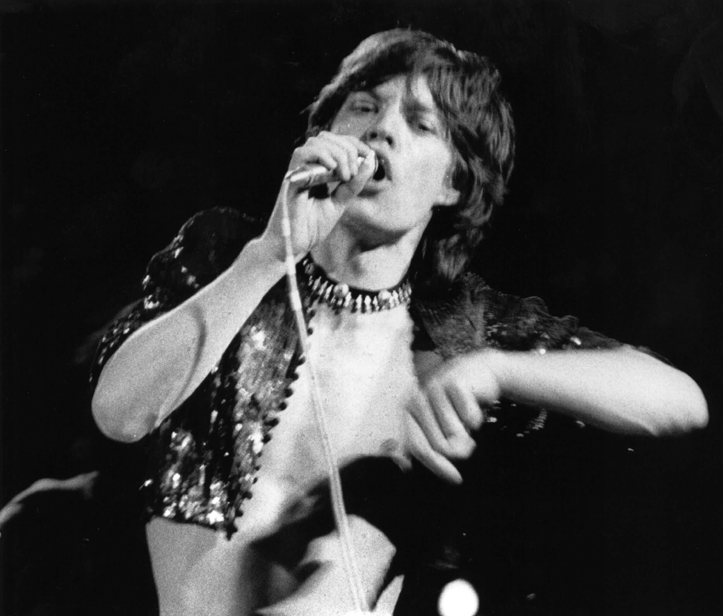 The Rolling Stones' Mick Jagger with a microphone