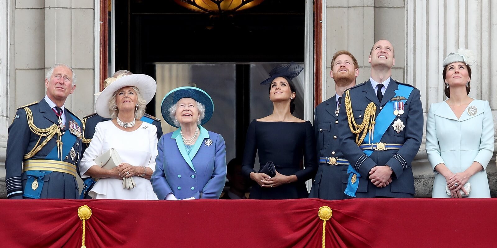 Prince Charles, Camilla Parker Bowles, Queen Elizabeth, Meghan Markle, Prince Harry, Prince William and Kate Middleton on the Buckingham Palace balcony in 2018.