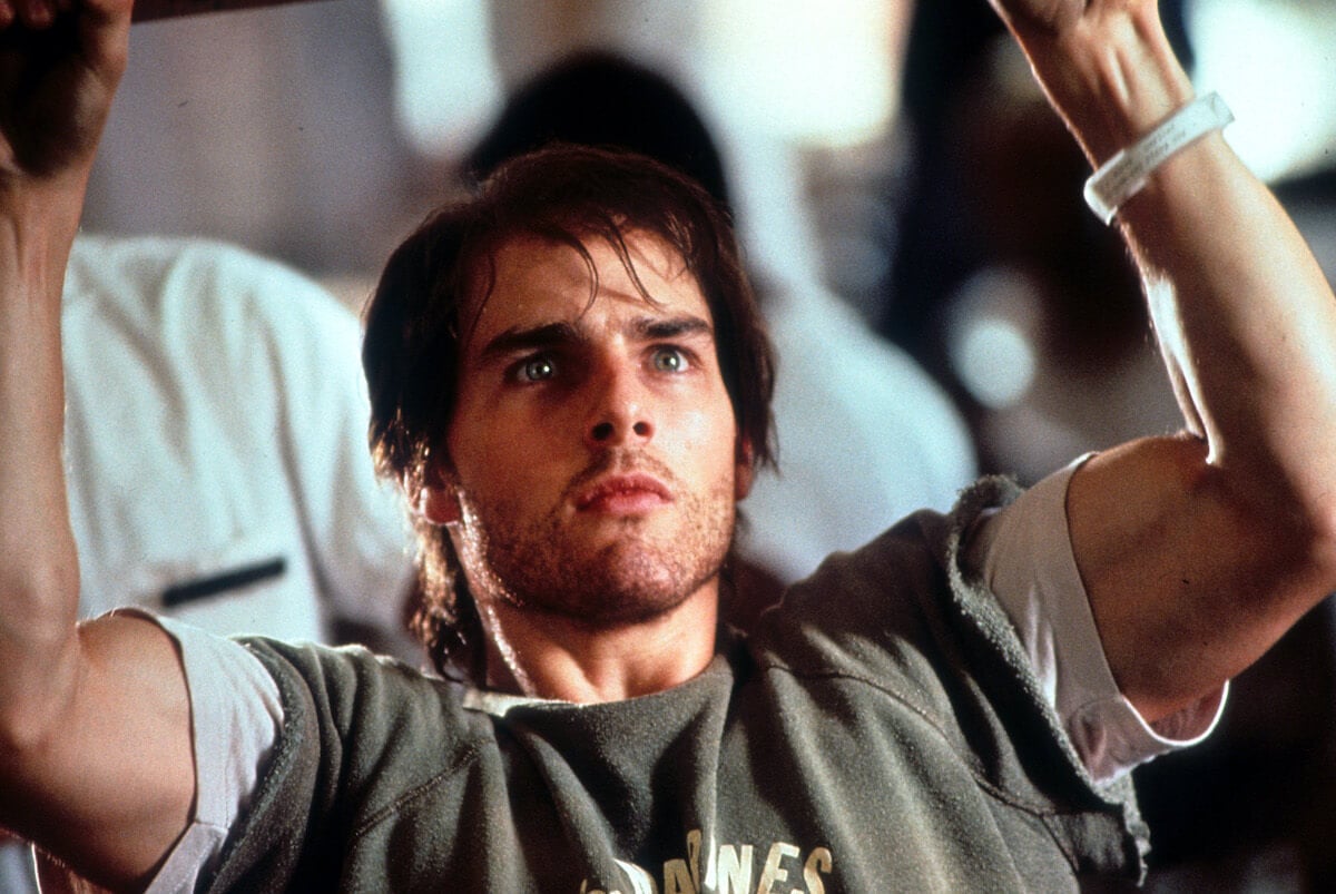 Tom Cruise doing pull-ups in a scene from the movie 'Born on the Fourth of July'