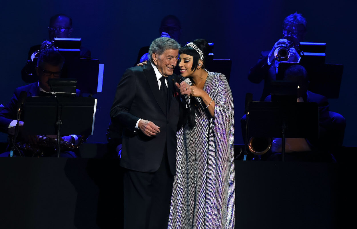 Tony Bennett (left) and Lady Gaga sing cheek-to-cheek during a 2014 New Year's Eve concert.