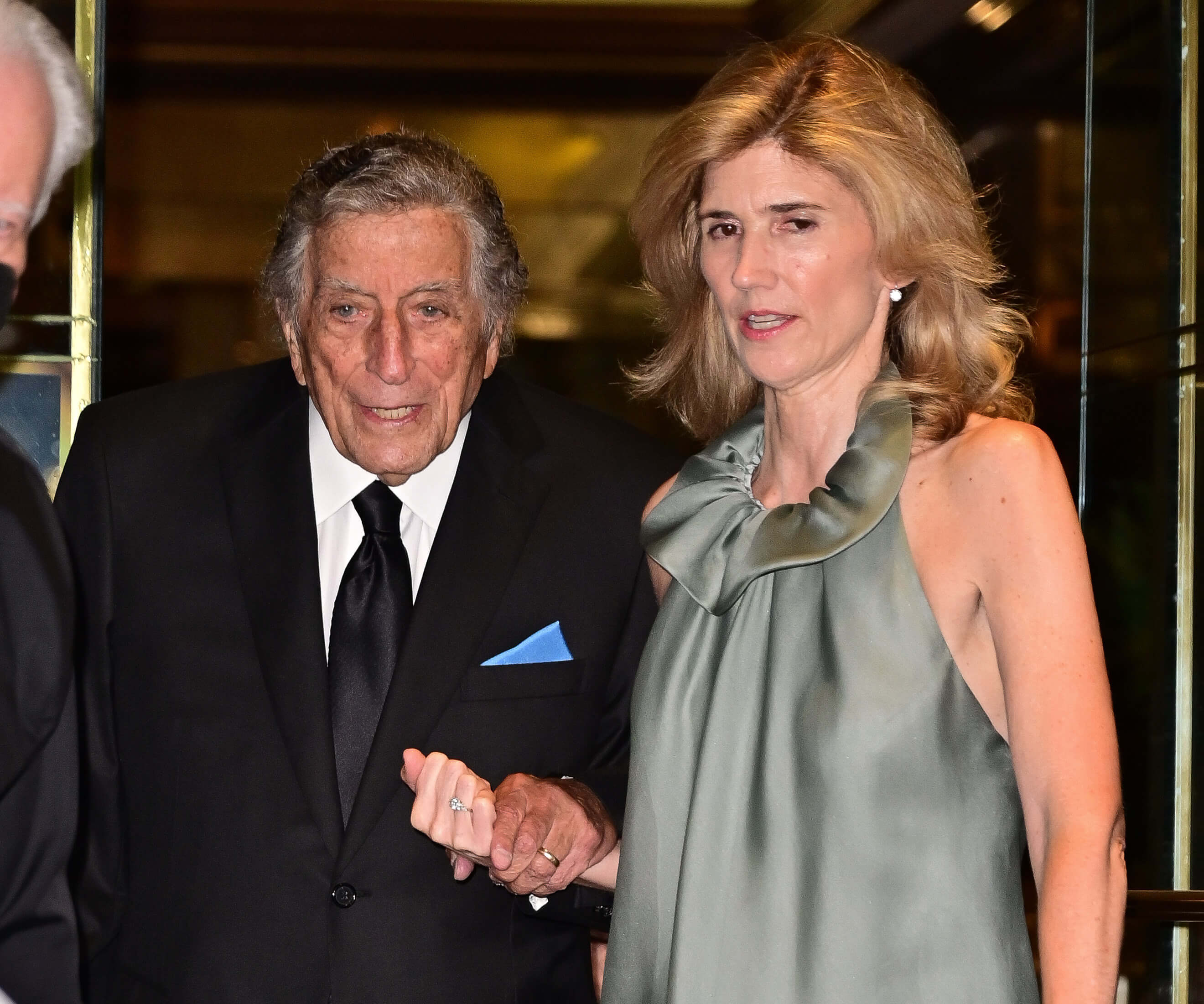 Tony Bennett and his wife, Susan Benedetto, walking together